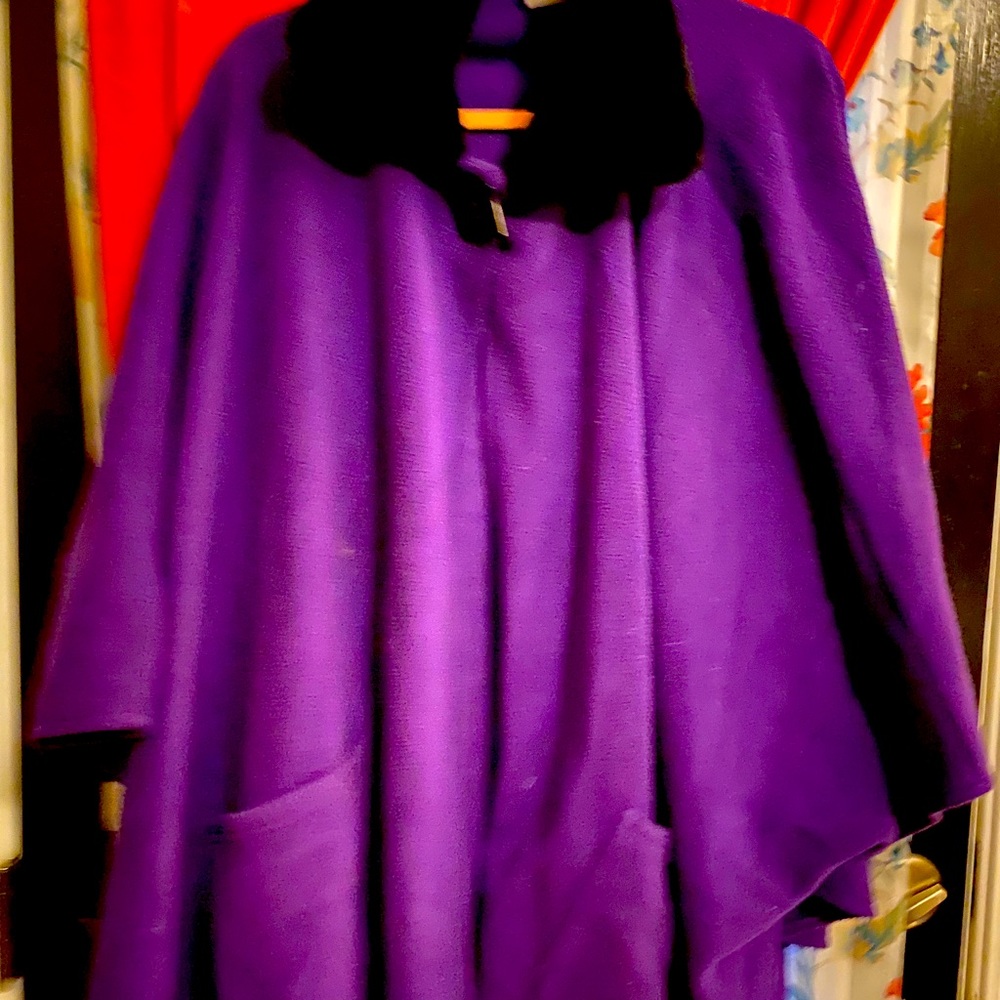 Classy faux fur collar cape.